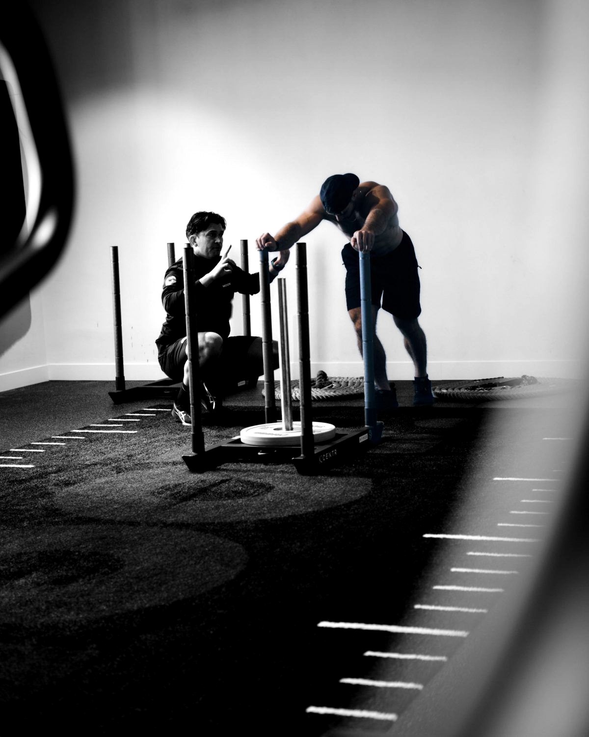 Philip Naessens coaching Siebe on the sled push